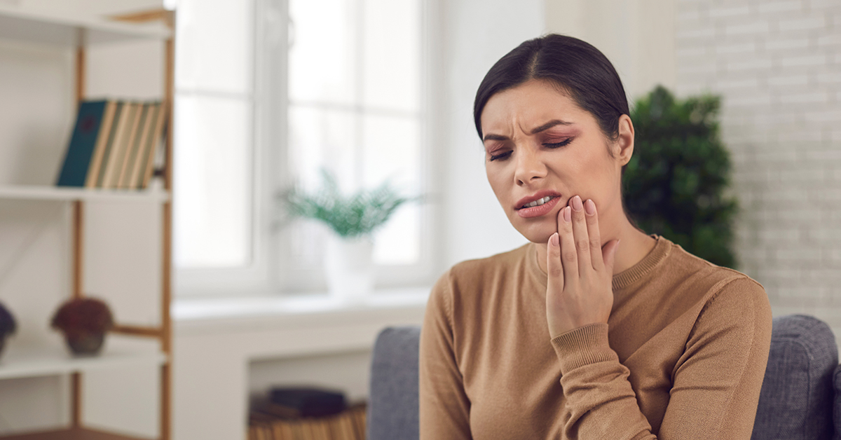 woman with tooth pain